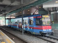 614綫拖卡1160-1159（多啦A夢主題列車）正駛離兆康站