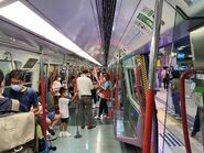 MTR staff distribute MLR postcard to passengers 06-05-2022 (2)