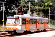 LRT1028-SPC.jpg (71 KB) A Phase I LRV in the orange and white livery of the KCR