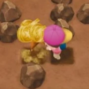 Pete using his hoe to dig up money