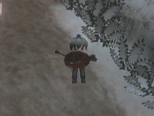 The player showing off a captured Wood fish on the trail to the Harvest Goddess Springs