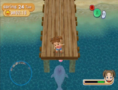 Waving to the dolphin of the beach pier.