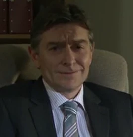 The Dean (Malcolm Tomlinson)