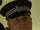 Policeman (Simon Holland Roberts)