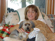 Recovering.  Foot propped up, and comfort from the puppy and an ice bag.
