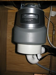 the actual garbage disposal unit under the sink