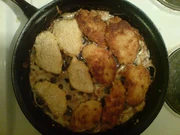 Frying chicken:  On the left side the chicken hasn't been flipped yet, so the side you see hasn't been fried.  On the right, you see  the browned, already fried side of the chicken.