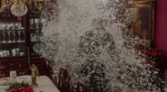Harry is covered with feathers blown by a fan in Home Alone.