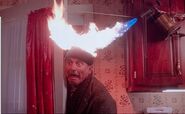 Harry's head is sprayed with fire by a blowtorch in Home Alone.