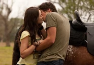 Evie and Josh kissing