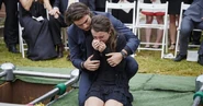 Evie cries in Josh's arms