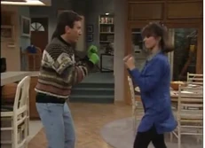 Tim and Jill play-fighting