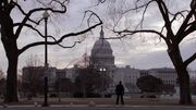 Brody pauses from his jog to gaze at the Capitol Building.