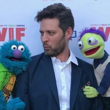 Joe Starr with his felted friends Cucumber and Chunk.