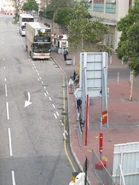 此站為九巴12線總站和城巴A21線往機場方向中途站（2011年4月）