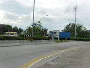 Scenic Road intersects midway with roundabout connecting to Chun Yue Road and East Coast Road (August 2012)