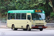 A Route 140M minibus is passing through Tam Kon Shan Interchange