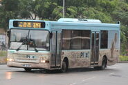 A bus on Route 694 was passing through Chai Wan Road near Yue Wan Estate