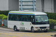 NR764線前用車三菱Rosa（PU1268）駛入屯興路
