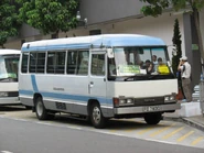 舊款豐田Coaster行走豫豐花園睇樓車（2007年）