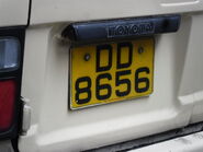 豐田代理皇冠汽車代辦的車牌（車尾），下方有舊皇冠車行的標誌及「CROWN MOTORS LTD」的字樣，已於1993年秋季不再推出，舊皇冠車行的標誌則被現時的豐田標誌的車牌取代