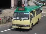 A minibus on Route 50K was departing from Sheung Shui Station