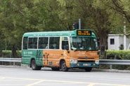 A Route CX1 minibus JY199 (Equipped with the advertisement of West Kowloon Cultural District) was passing through Museum Drive (Dispatched from Kellis, July 2022)