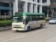 Route 507 minibus VN8257 observes Fanling Station Road (October 2024)