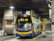 A bus on Route 50 waiting to depart from Kowloon Station Public Transport Interchange