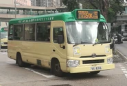 A minibus on Route 50K was departing from Sheung Shui Station