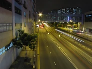 Night view of Kwai Chung Road near Kwai Hing Station, with the southern flyover connecting at this point