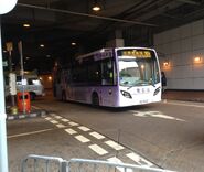 A bus on Route 203S was departing from Festival Walk