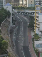 TungHei-HingTung.jpg (50 KB) 遠眺東熹苑站(左)及此站(右)