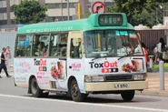 A Route 68 minibus LX950 was passing through Sheung Yee Road
