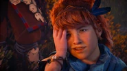 Aloy sobbing in pain.