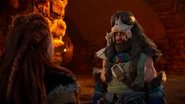 Ukan talking to Aloy about the Hunters Lodge.