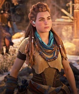 Aloy wearing the Outcast outfit in Horizon Zero Dawn Remastered.
