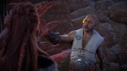 Olin talking to Aloy.
