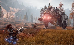 Aloy and  fighting a Thunderjaw