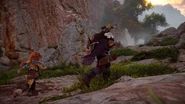 Aloy and Rost rushing to investigate the scream.