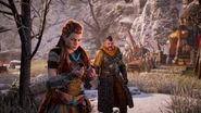 Aloy looking at the ear defenders.