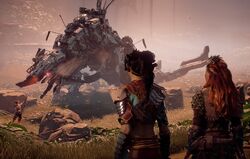 Talanah and Aloy watching Ahsis fight Redmaw.
