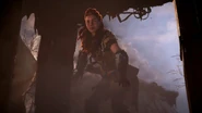 The dirt falling on Aloy.