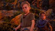 (Drop your rock) Bast preparing to throw another rock at Aloy.[2]