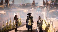 Aloy, Hekarro and Kotallo standing before the Arena.