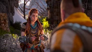 Aloy explaining the ear defenders.