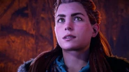 Aloy watching the hatch open.