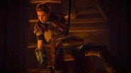 Aloy rappelling into the ruin.