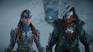 Aloy and Aratak watching the door open.