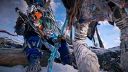 Aloy driving her spear at Aratak's feet.